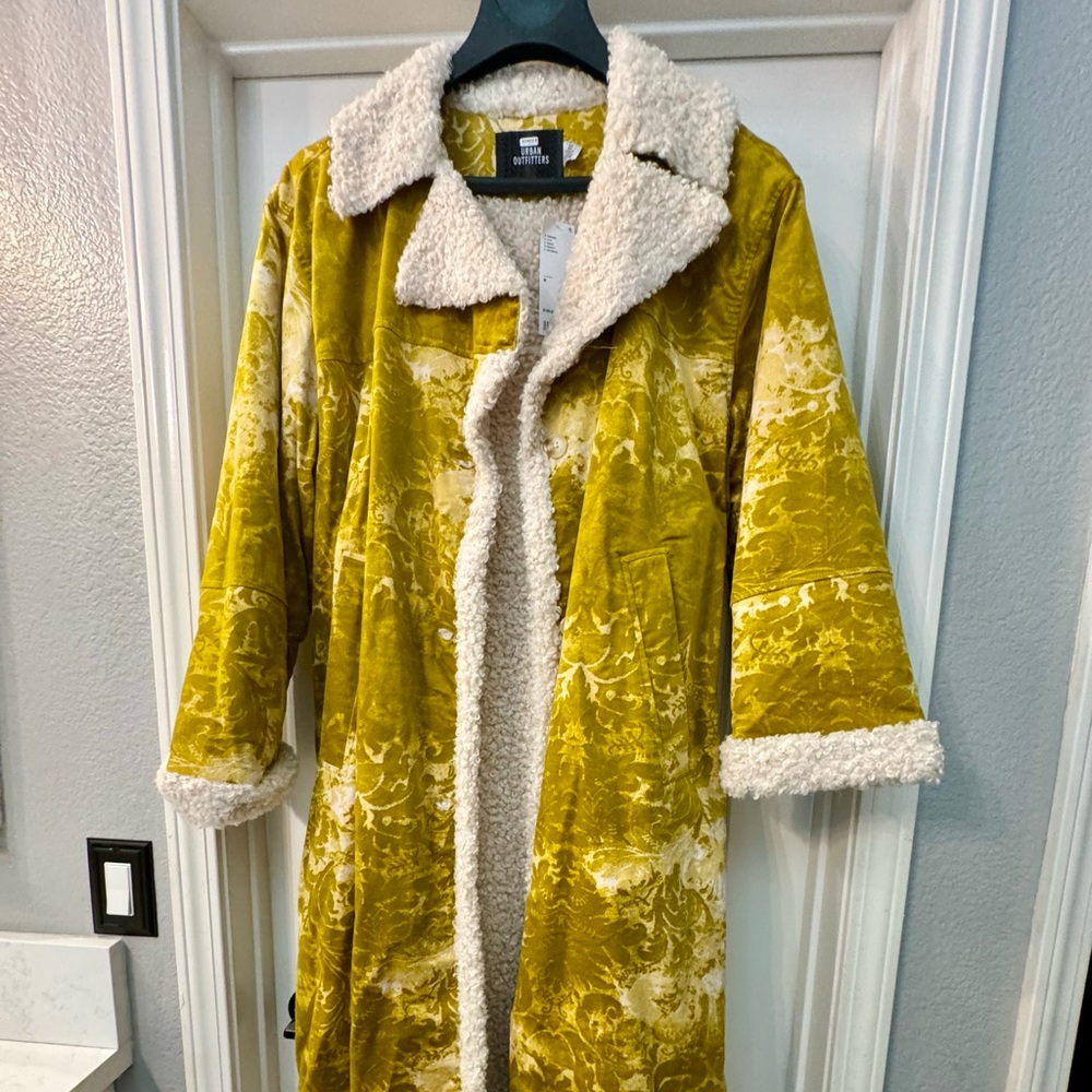 Really cool coat from Urban Outfitters never worn. New with tags.